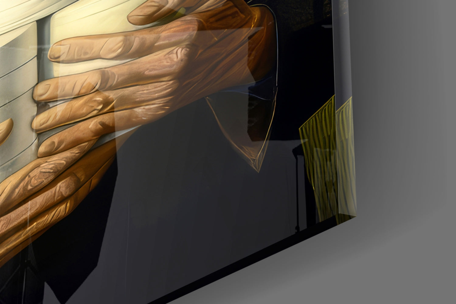 Close-up detail of bronze sculptural hand reaching toward translucent glass panel with yellow-green striped accent.