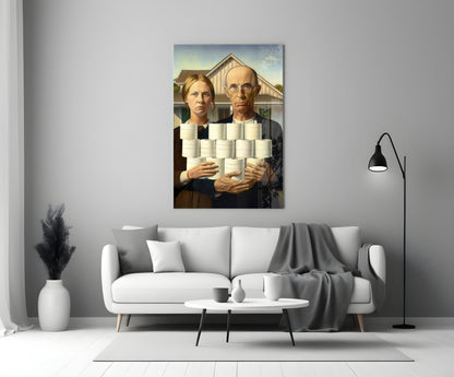 Modern living room with white sofa displaying glass wall art featuring two figures holding white cylindrical objects against farmhouse background.