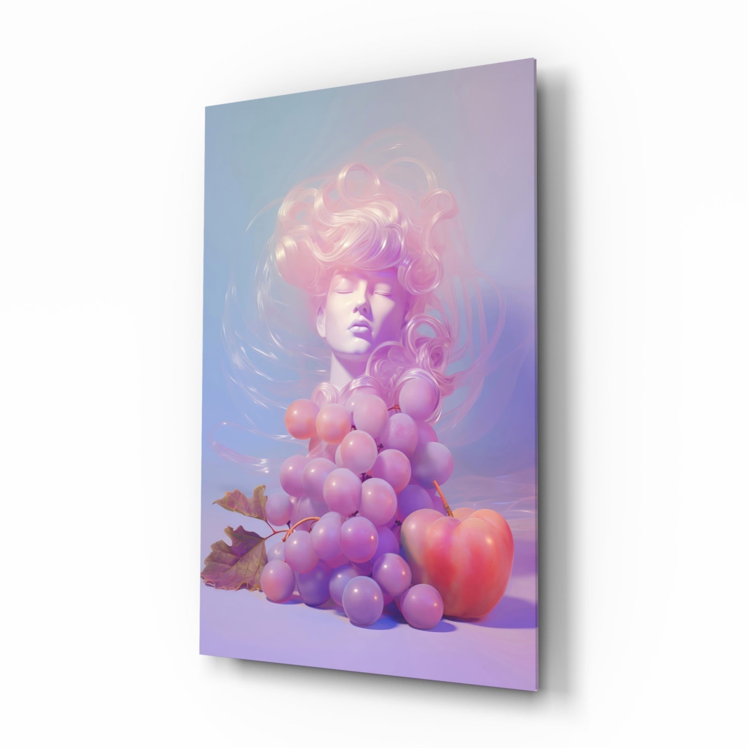 Angled view of glass wall art showing sculptural female head with pink wavy hair above clustered purple grapes and red apple on gradient purple-blue background.