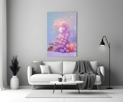Vertical glass art panel displaying a surreal figure with pink hair surrounded by purple and pink grapes against a blue gradient background, hung above a white sofa.