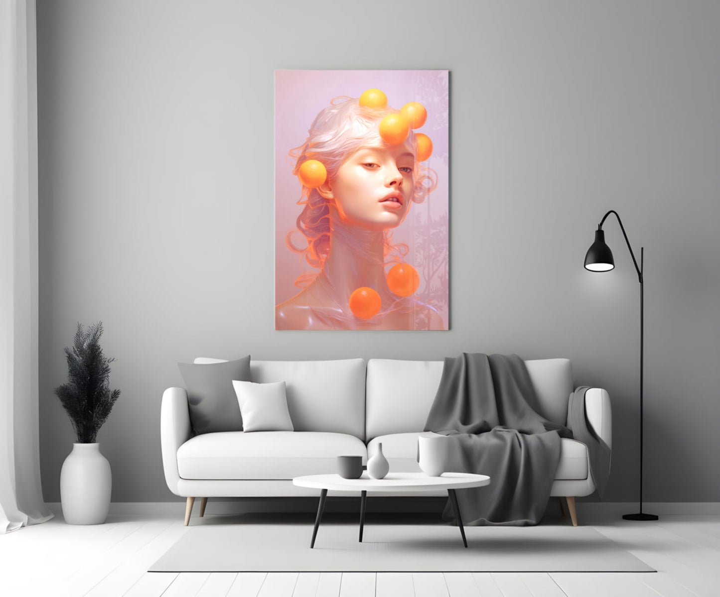 Queen of Orange glass wall art displayed above a white sofa in a minimalist living room setting.
