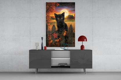 Black cat with glowing eyes in autumn harvest scene with full moon, displayed above gray media console in modern interior setting.