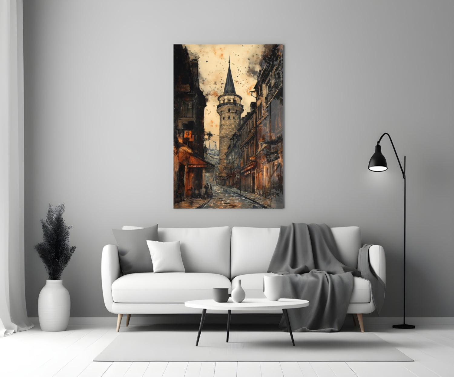 Galata Street Glass Wall Art hanging above white sofa in modern living room, showing historic tower street scene in warm sepia tones.