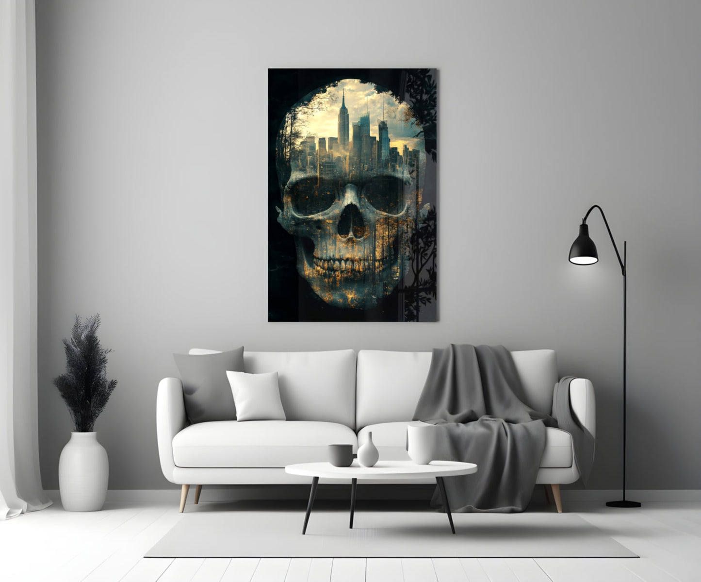 Glass wall art featuring a skull with a cityscape skyline visible through the eye sockets, displayed above a white sofa in a modern living room.