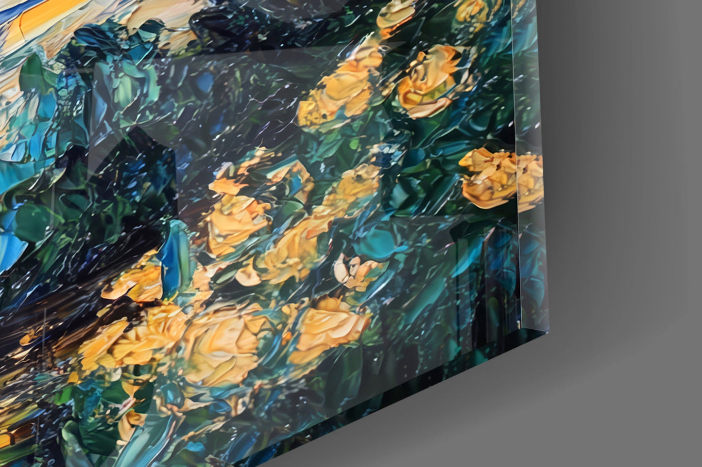 Close-up angled view of glass art showing swirling yellow flowers and blue-green brushstrokes with reflective surface detail.