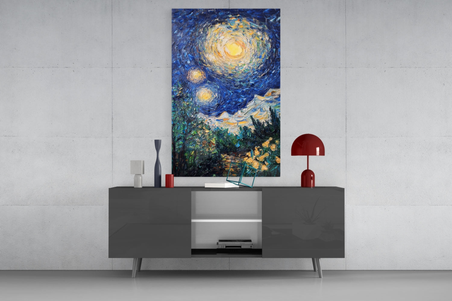 Starry Night glass wall art displayed above a dark gray media console with red decorative lamp and accessories against white wall.
