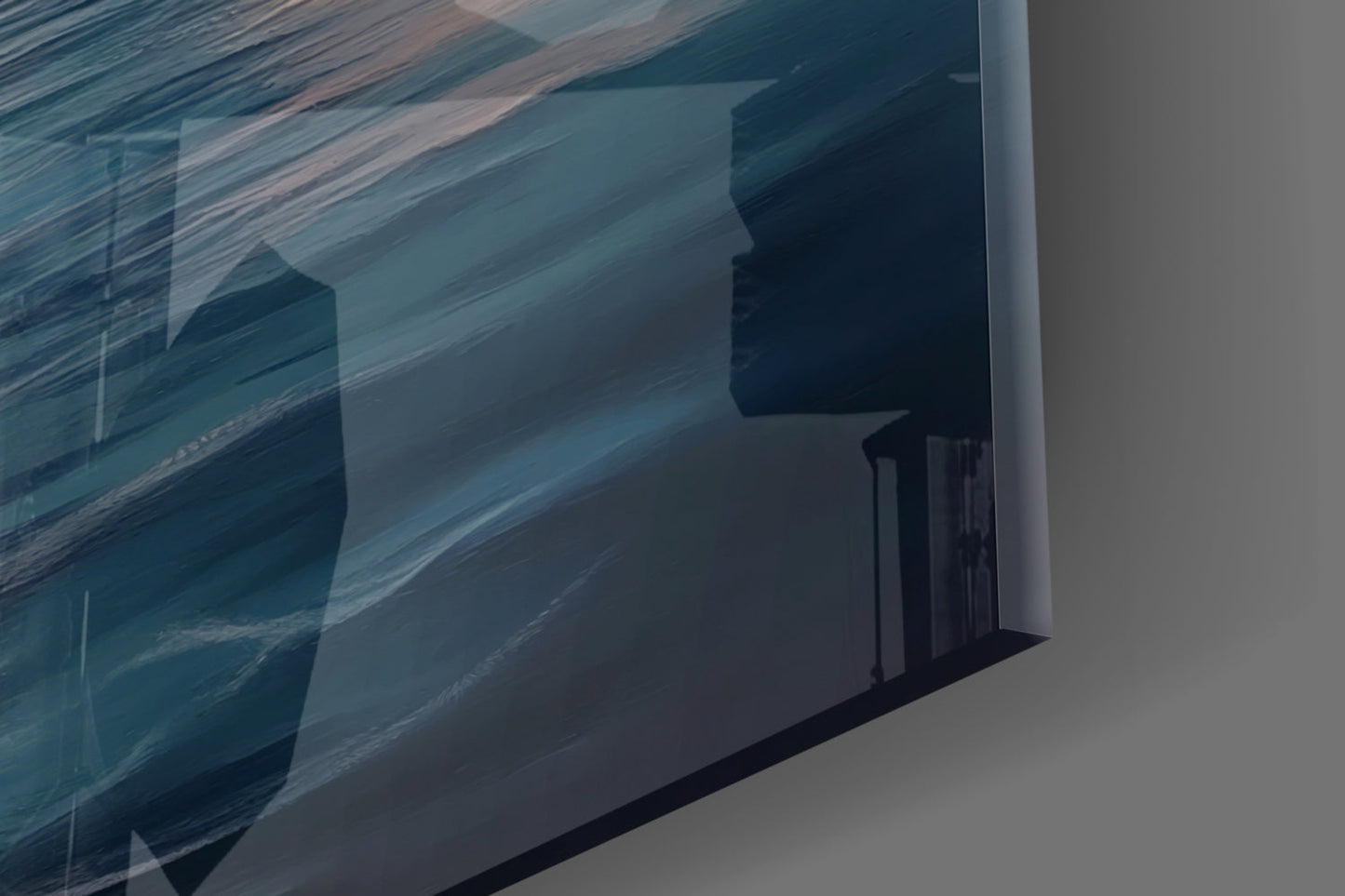 Close-up angled view of glass wall art showing layered sailboat silhouettes in blue and teal tones with wood grain texture.