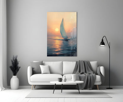 Sailboat glass wall art hanging above white sofa, depicting golden sunset over calm water with coastal cityscape silhouette.