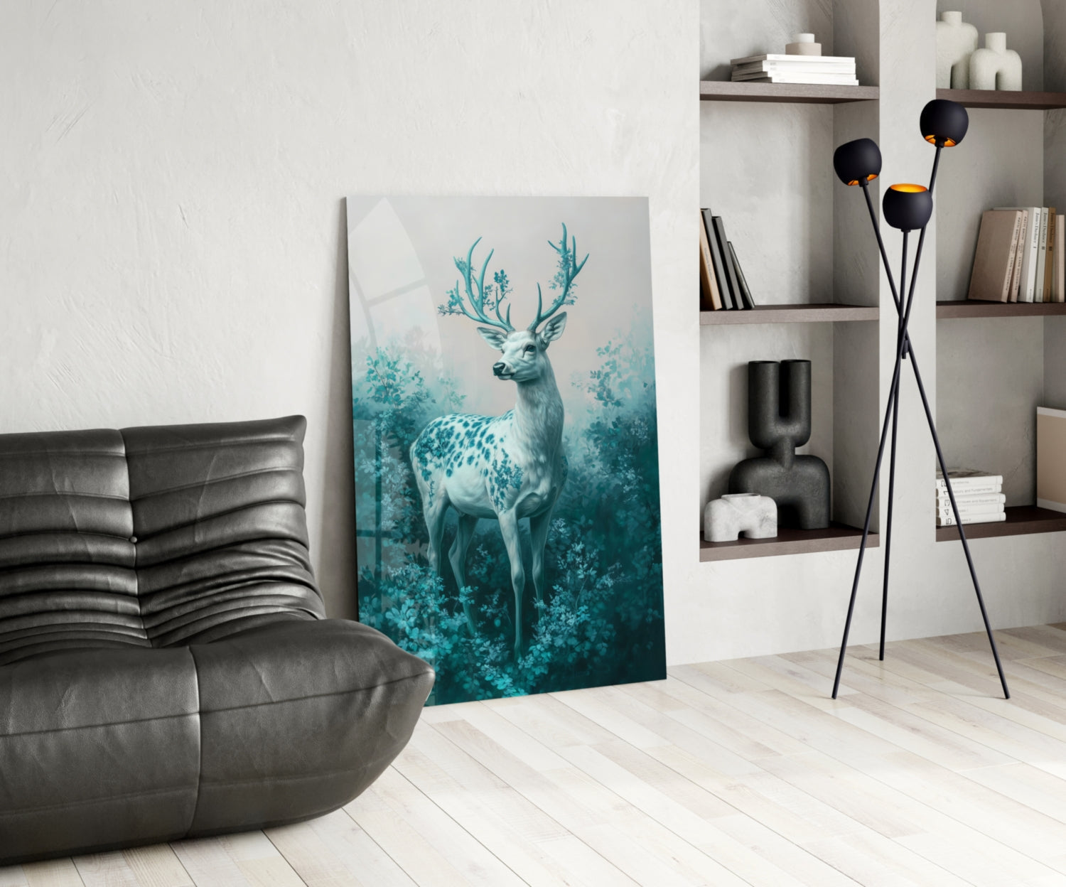 Mint Deer Glass Wall Art leaning against white wall in modern living room with gray sofa and shelving.