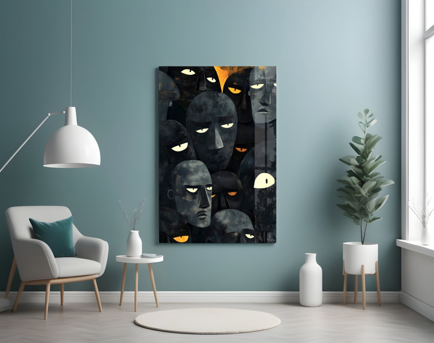 Modern living room with teal walls displaying vertical glass artwork of overlapping dark faces with glowing yellow and orange eyes.