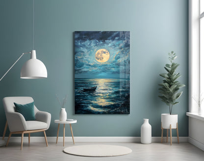 Moonlit seascape glass wall art with boat displayed in serene teal living room setting.