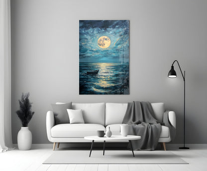 Full moon glass wall art depicting a moonlit seascape with a lone boat, displayed above a white sofa in a modern living room.