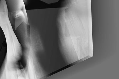 Close-up detail of frosted glass art showing layered translucent panels with soft shadows and gradated tones.
