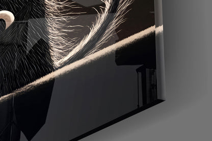 Close-up of black glass wall art with white illuminated cat silhouette and whiskers detail against dark background.