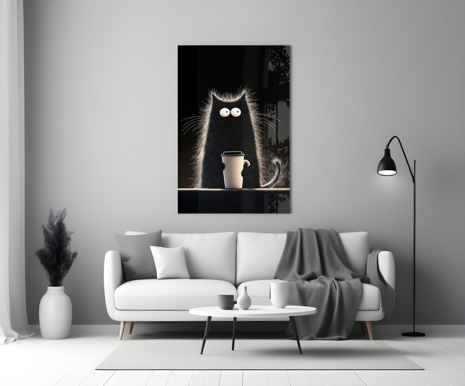Black cat glass wall art with large white eyes holding coffee cup, displayed above white sofa in minimalist living room.