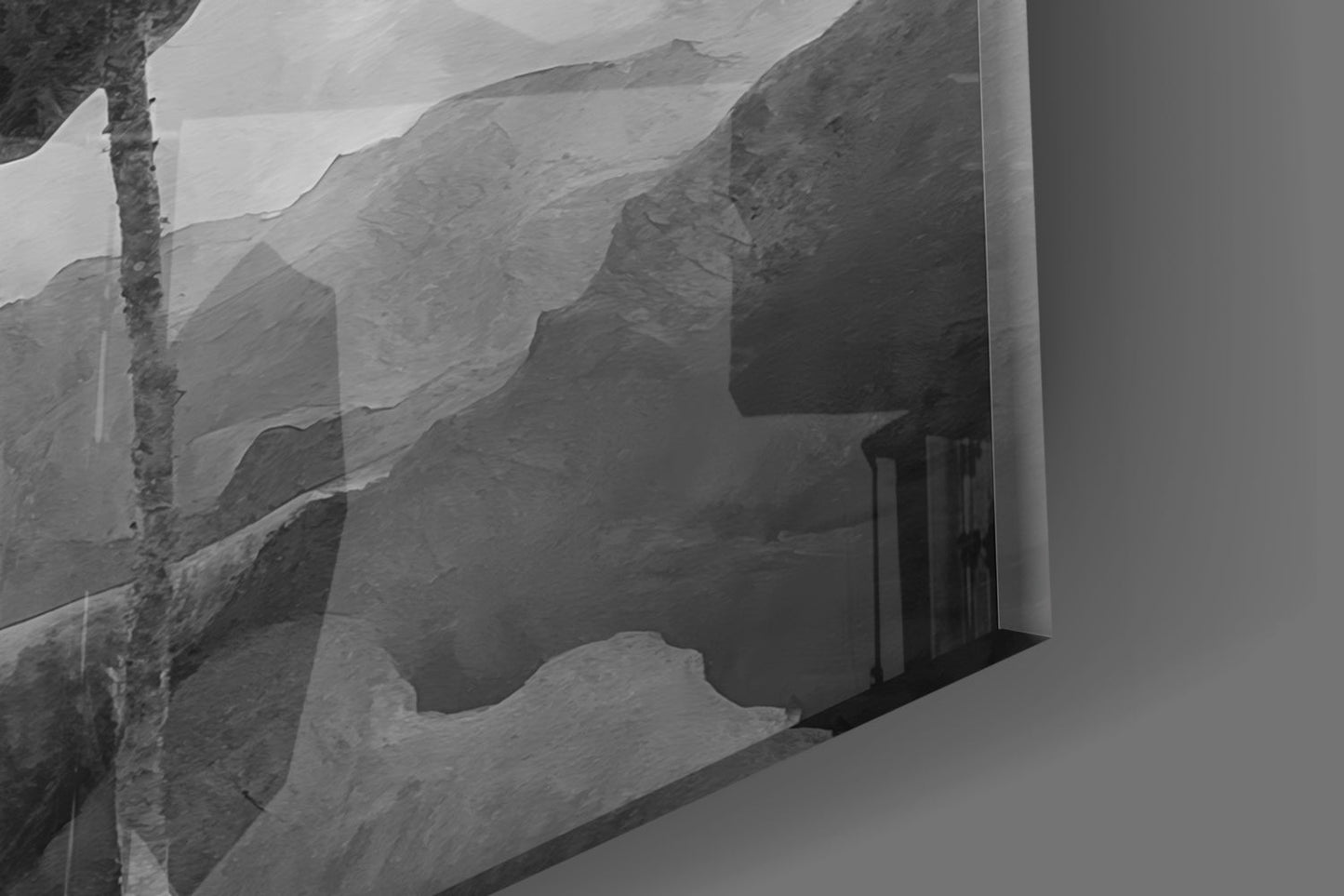Close-up detail of textured glass surface with layered wavy patterns and shadows in black and white tones.