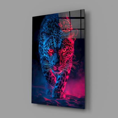Angled view of neon leopard glass wall art showing blue and pink illuminated design mounted on gray wall.