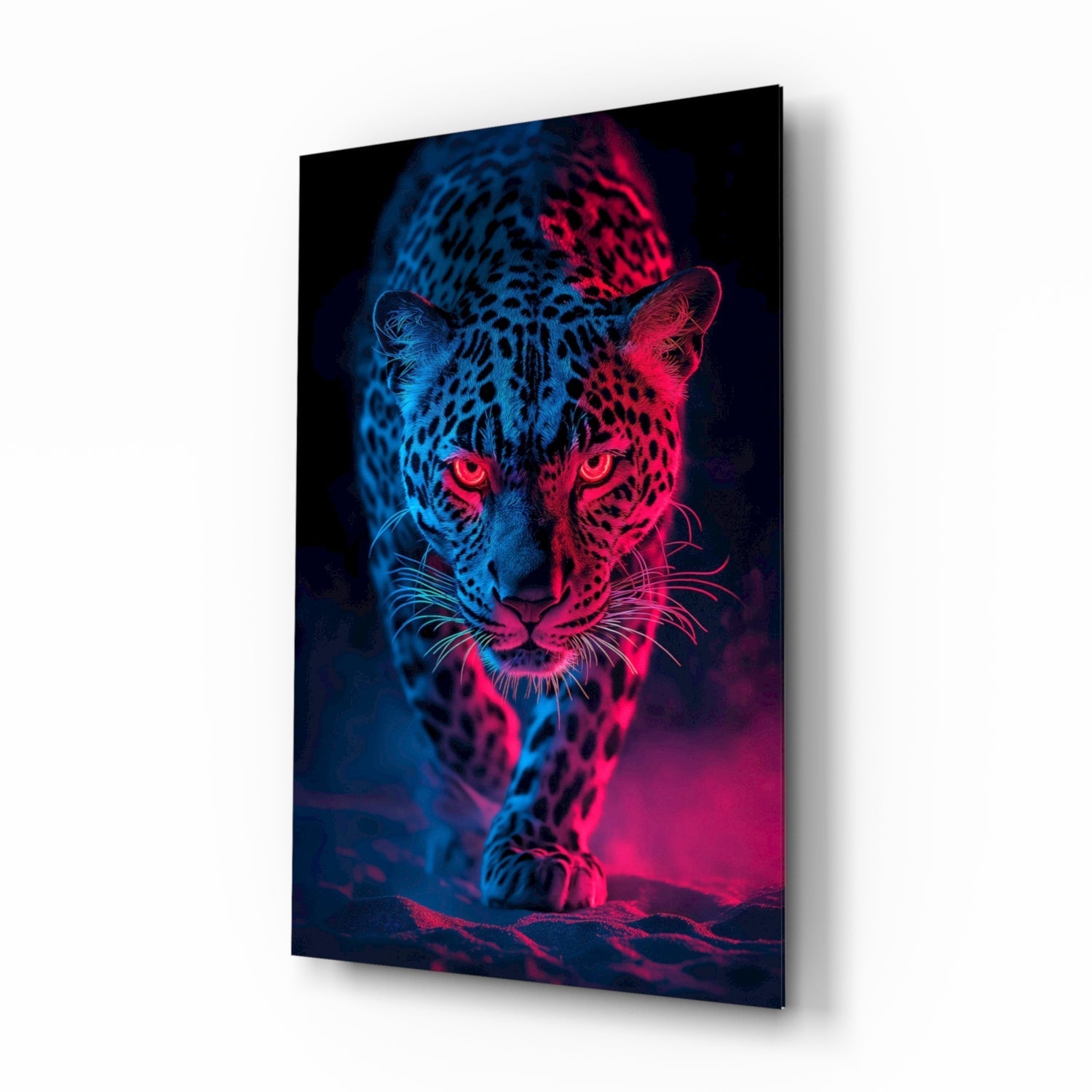 A neon leopard portrait with split blue and pink lighting on a glass panel, displayed at an angle showing the shadow on the wall behind it.