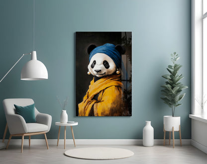 Panda wearing blue headwrap and yellow jacket with pearl earrings displayed on teal wall in modern living room setting.