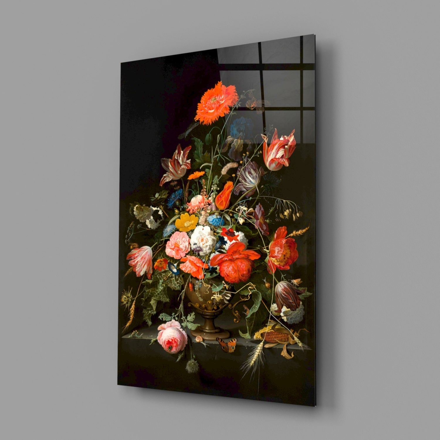 Glass wall art panel displaying a classical floral still life painting with vibrant red, orange, and white flowers in a bronze vase against a dark background.