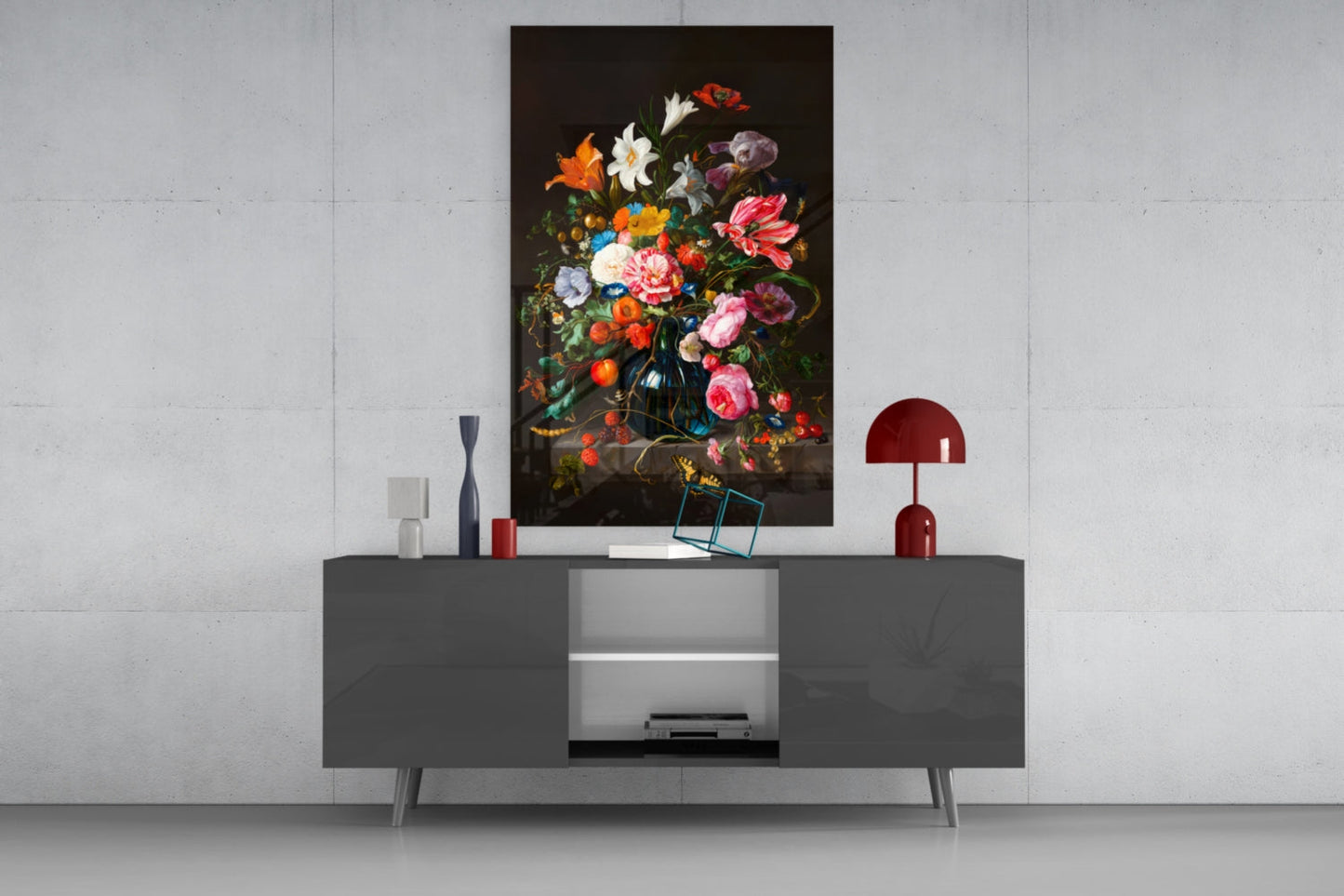 Classical still life floral glass wall art with vibrant flowers on dark background displayed above modern gray media console.