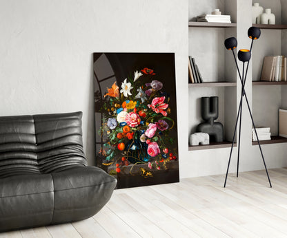 Classical Still Life Glass Wall Art depicting vibrant multicolored flowers in dark vase displayed in modern living room with black sofa and shelving.