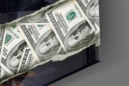 Close-up angled view of glass wall art featuring repeated portraits of a woman's face printed on white and green dollar bill-inspired design.