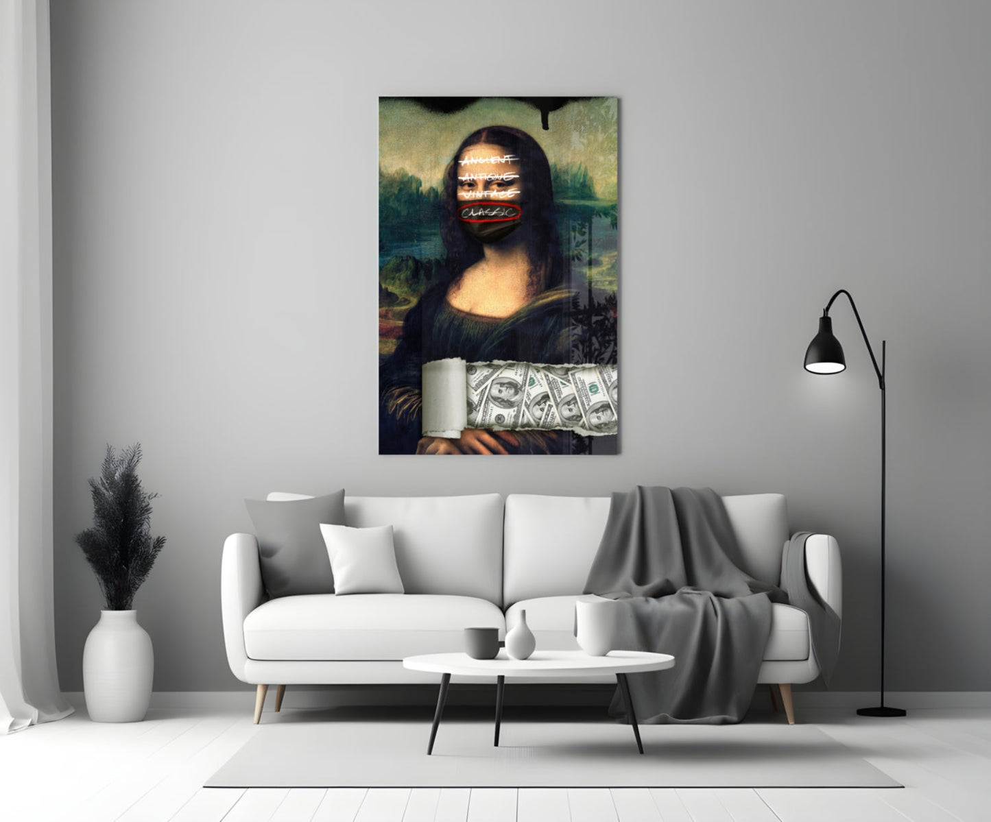 Modern Mona Lisa glass wall art with neon text overlay and dollar bills, displayed above white sofa in minimalist living room.