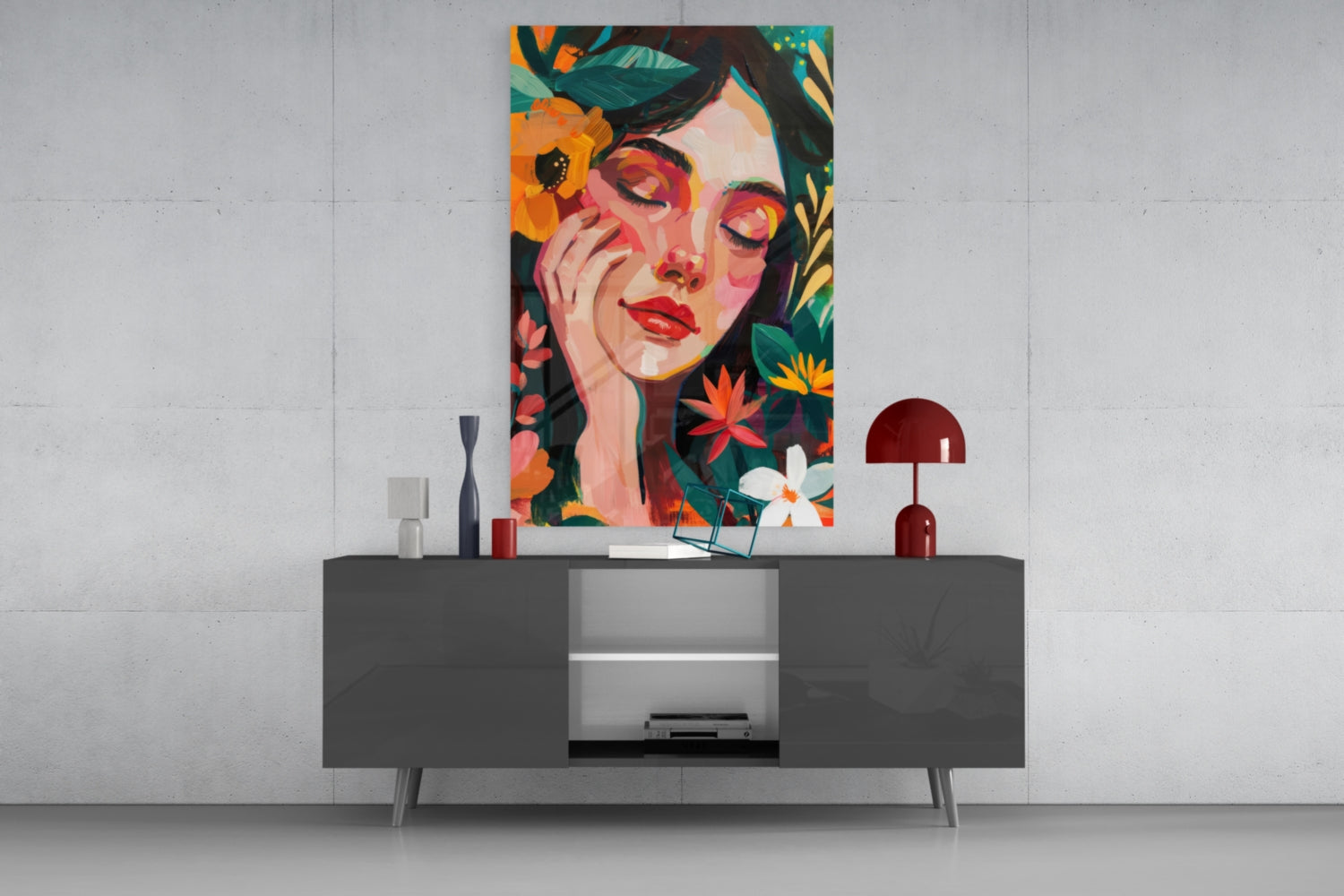 Colorful portrait glass wall art depicting a woman surrounded by vibrant flowers, displayed above a dark console table.