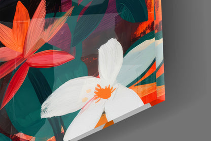 Colorful glass wall art featuring white flower with orange center, red petals, and teal leaves on angled perspective view.