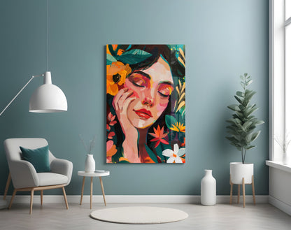 Colorful portrait glass wall art featuring a woman's face surrounded by vibrant flowers displayed in a modern room setting.