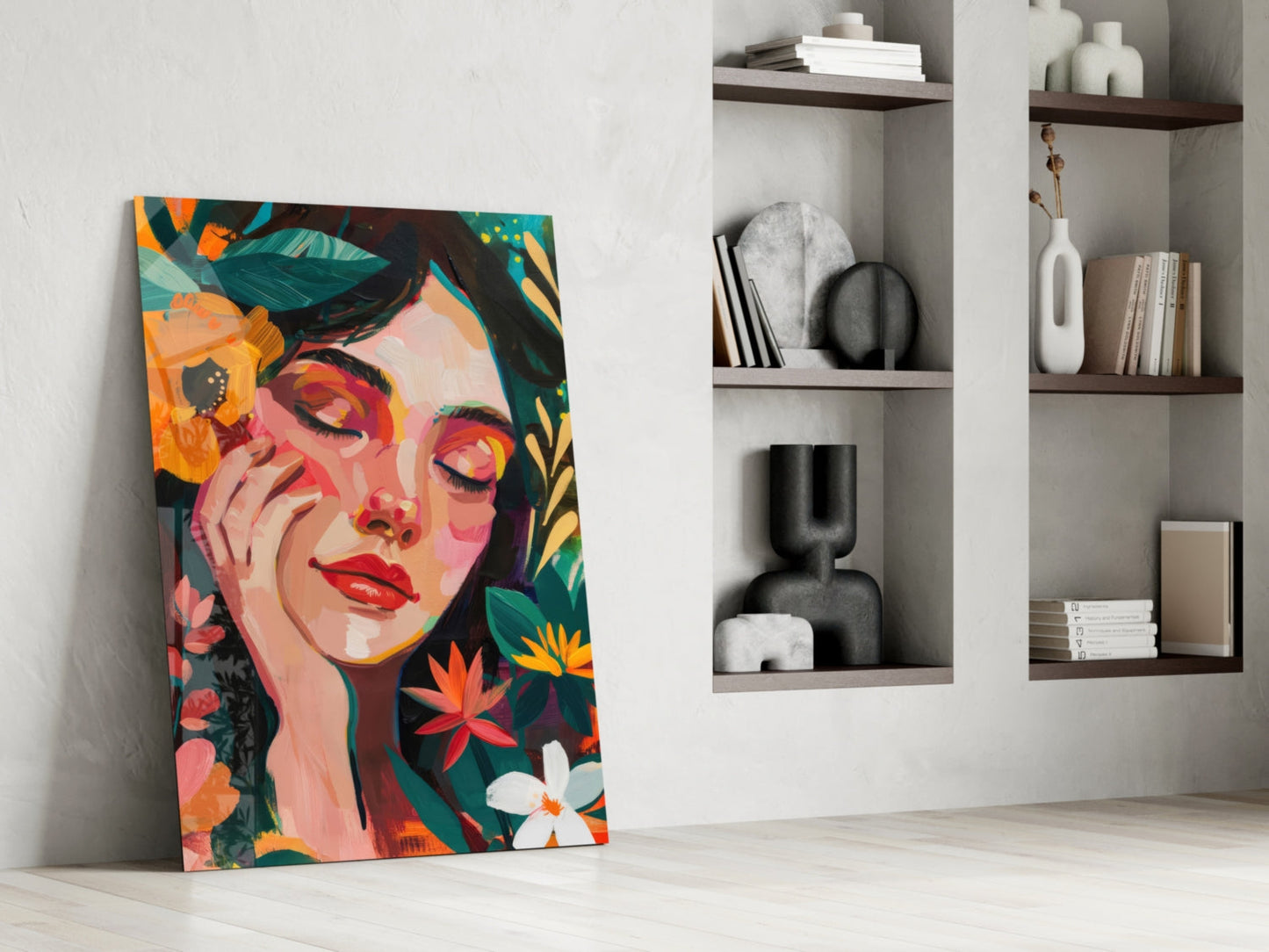 Colorful pop art portrait with vibrant florals leaning against white wall beside built-in shelving with decorative objects.