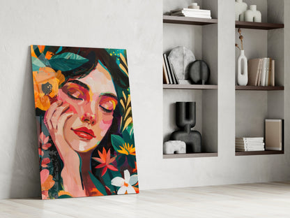 Colorful pop art portrait with vibrant florals leaning against white wall beside built-in shelving with decorative objects.