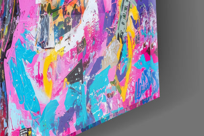 Angled close-up of vibrant multicolored graffiti glass wall art featuring pink, cyan, yellow, and purple paint splatters with white background sections.