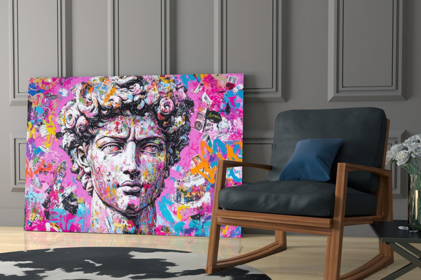 Vibrant graffiti-style glass wall art featuring a classical bust with pink, magenta, and multicolored abstract elements displayed in a modern interior next to a wooden chair.