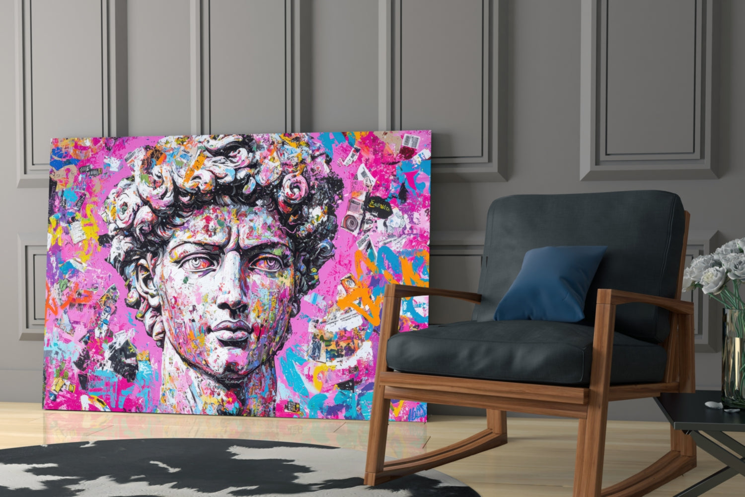 Vibrant graffiti-style glass wall art featuring a classical bust with pink, magenta, and multicolored abstract elements displayed in a modern interior next to a wooden chair.