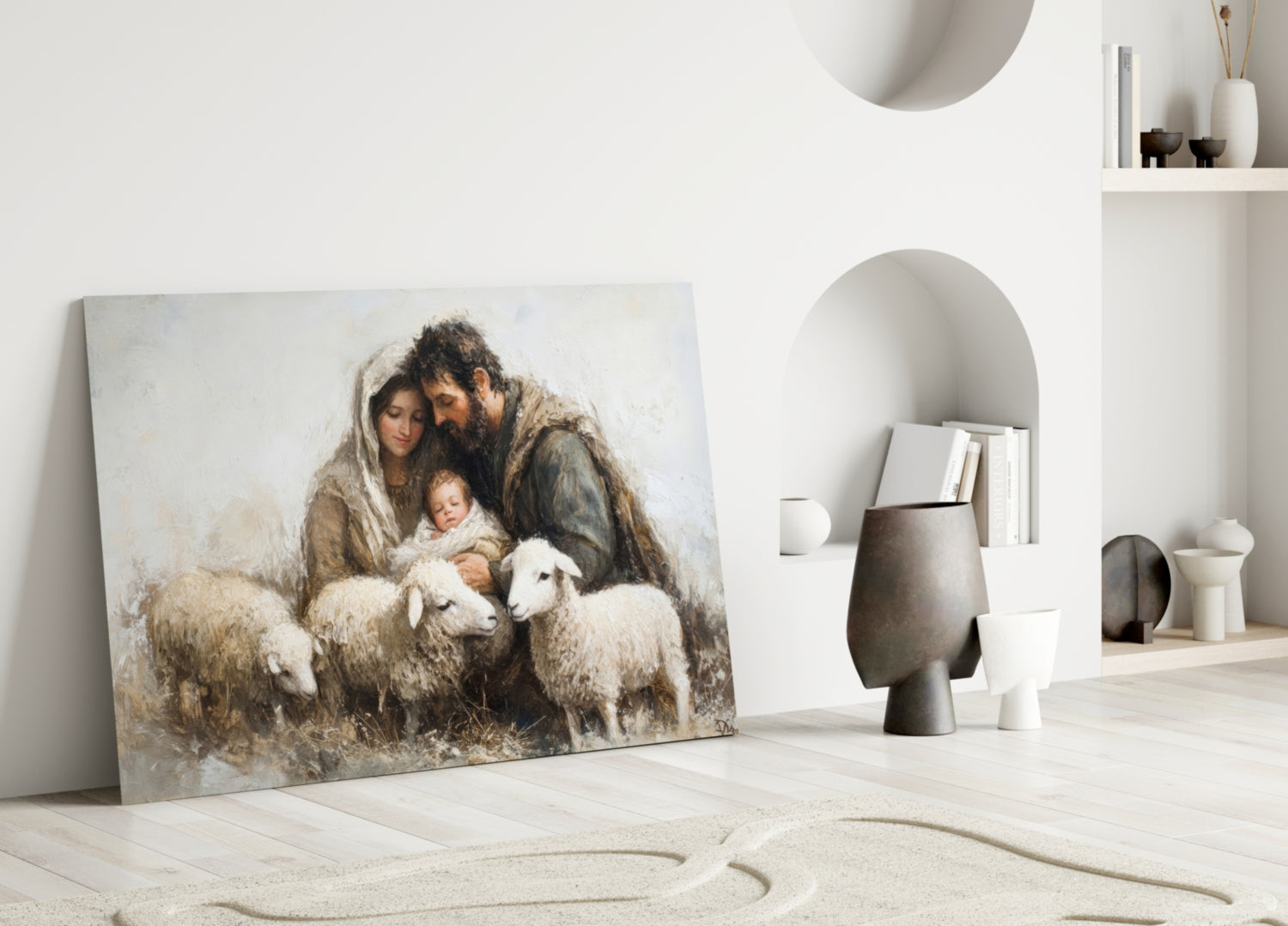 Glass wall art leaning against white wall displays painted figures of man, woman, and child with sheep in muted earth tones.