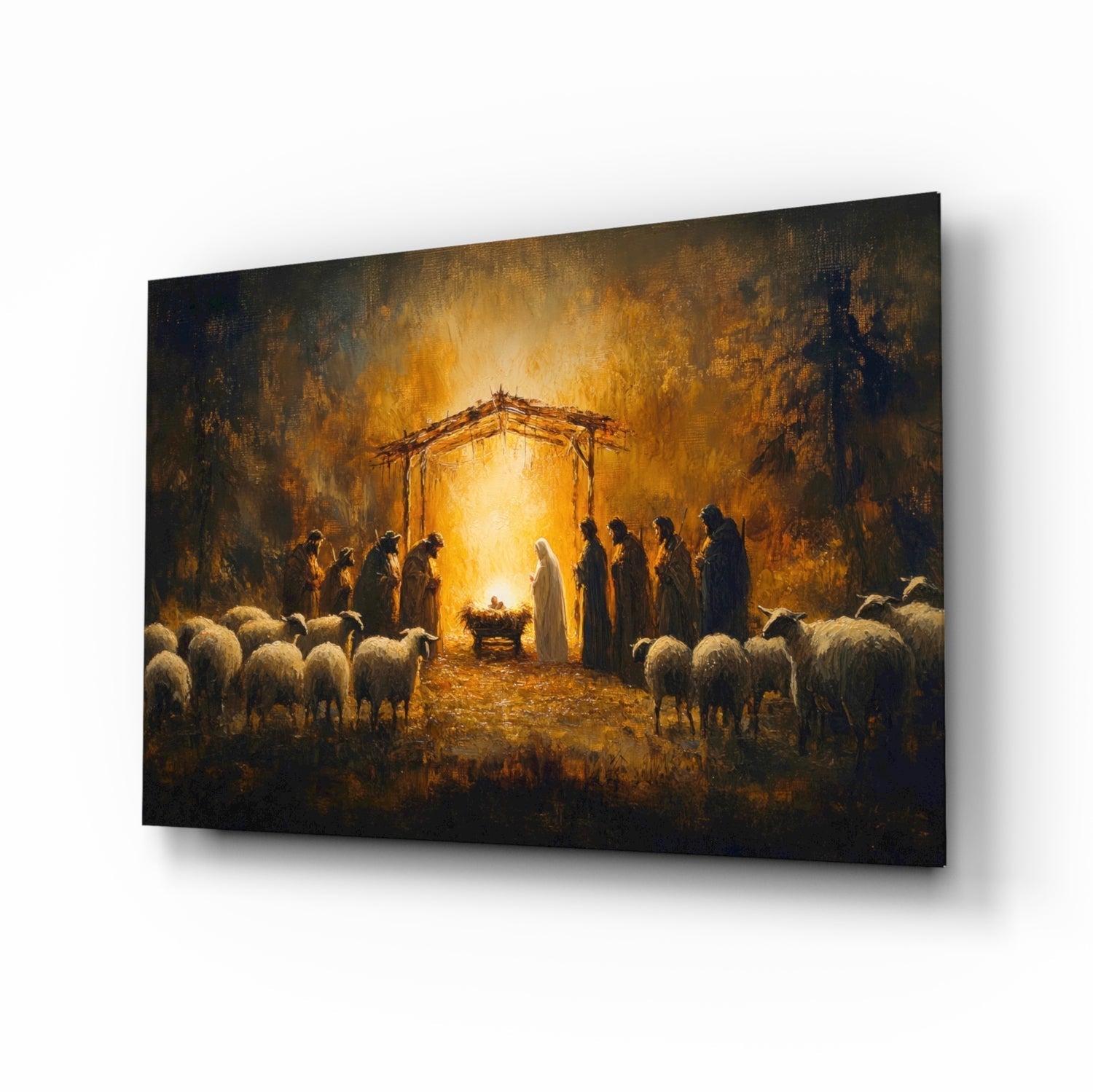 Glass wall art panel displayed at an angle showing a nativity scene with golden light, shepherds, sheep, and a wooden manger structure.
