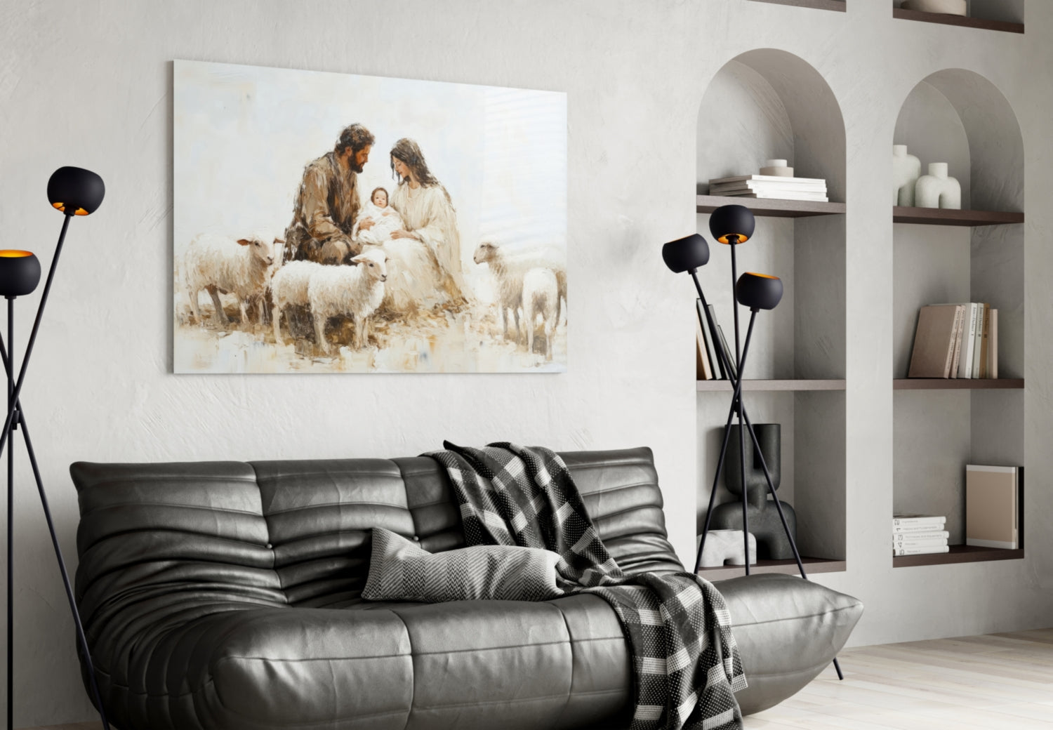 Glass wall art depicting a nativity scene with shepherds, sheep, and holy family in sepia tones, displayed above a black leather sofa in a modern living room.