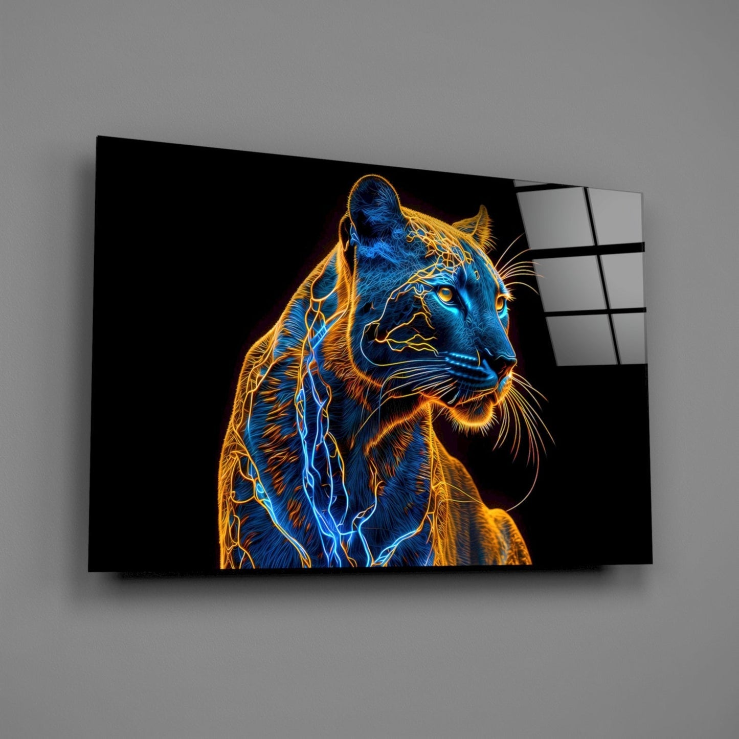 Neon jaguar glass wall art displayed at an angle showing blue and gold electric outlined big cat against black background on dark glass panel.