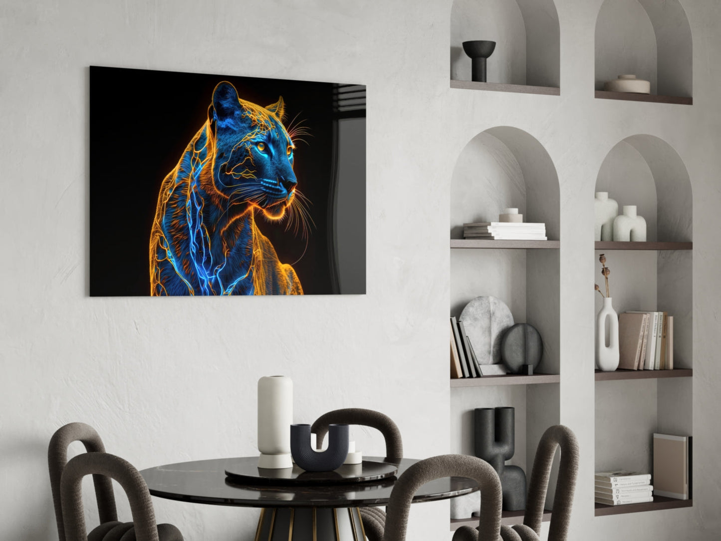 Neon jaguar glass wall art with blue and gold glowing lines displayed above a black dining table in a modern interior setting.