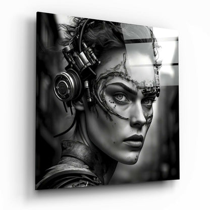 Black and white portrait of a cyborg woman wearing large headphones, shown in profile against a blurred background on glass wall art.