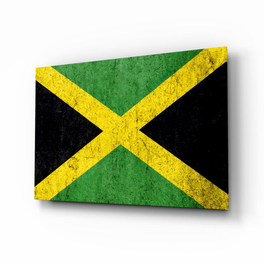 Jamaican flag grunge glass wall art displayed at an angle showing green, yellow, and black colors with distressed texture and shadow effect.