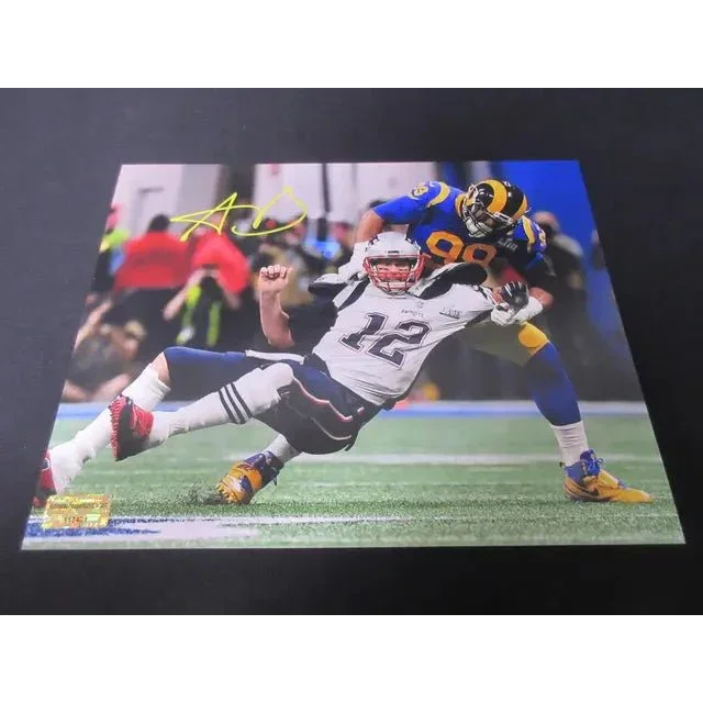 Aaron Donald signed action photo of Donald tackling Tom Brady with COA