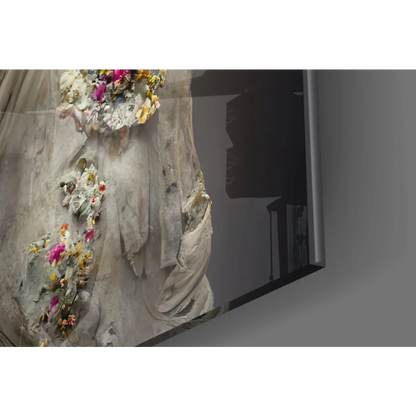 Delicate off-white lace gown with pink yellow orange floral embellishments on Floral Crown Statue wall art print