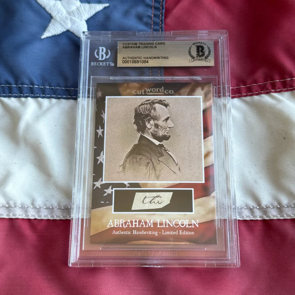 Framed custom trading card featuring a sepia abraham lincoln portrait with authentic lincoln legal document handwriting fragments encased in clear packaging