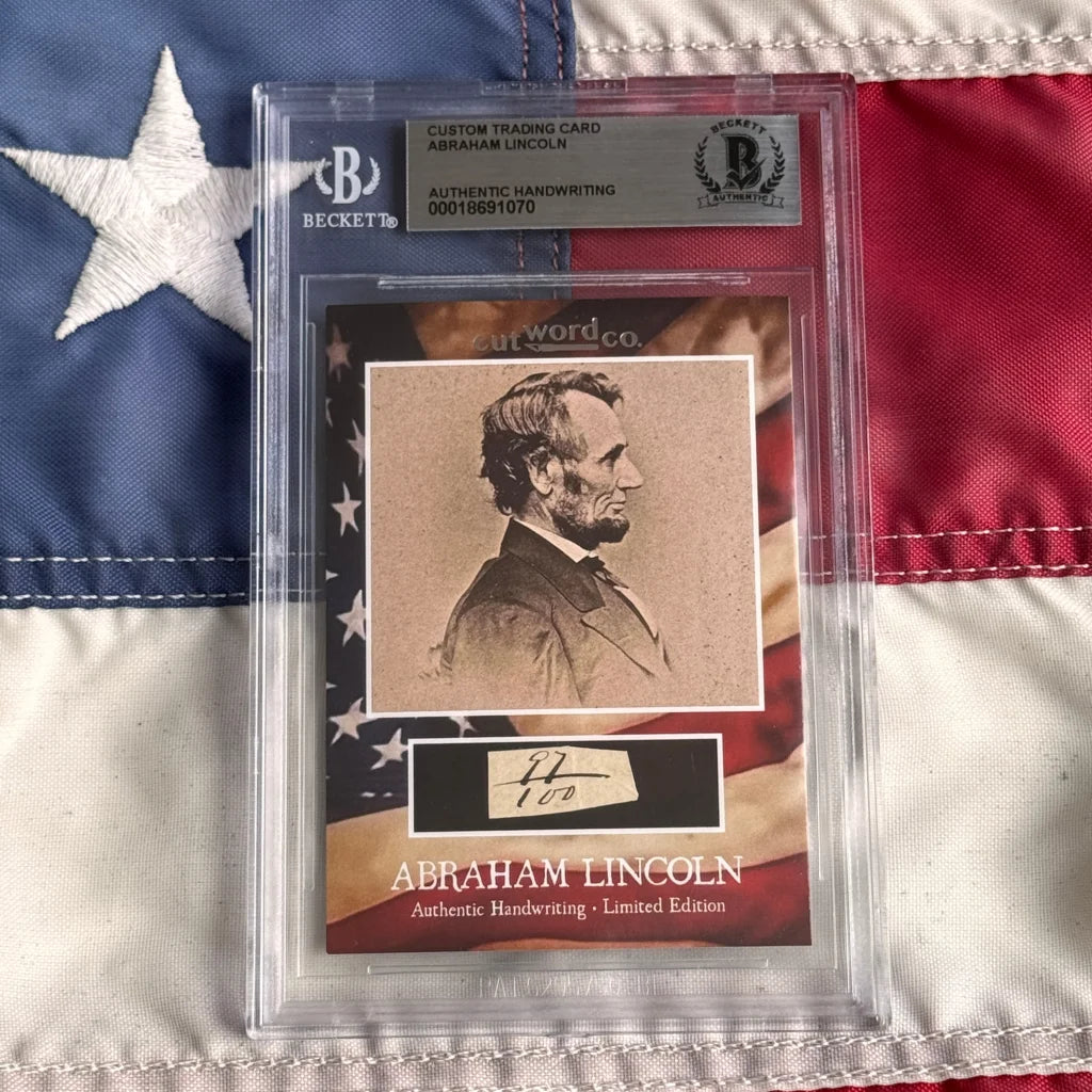 Framed sepia-toned abraham lincoln trading card with authentic lincoln handwriting fragments in clear protective packaging