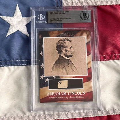 Beckett-authenticated abraham lincoln legal document card featuring lincoln handwriting fragments in clear protective slab