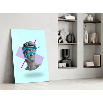 Stunning glass wall art of gray marble statue head with pink and blue geometric overlays