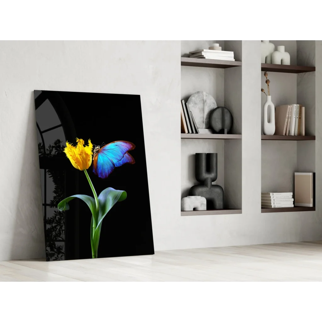Vibrant yellow tulip with blue butterfly on sleek black glass wall art canvas